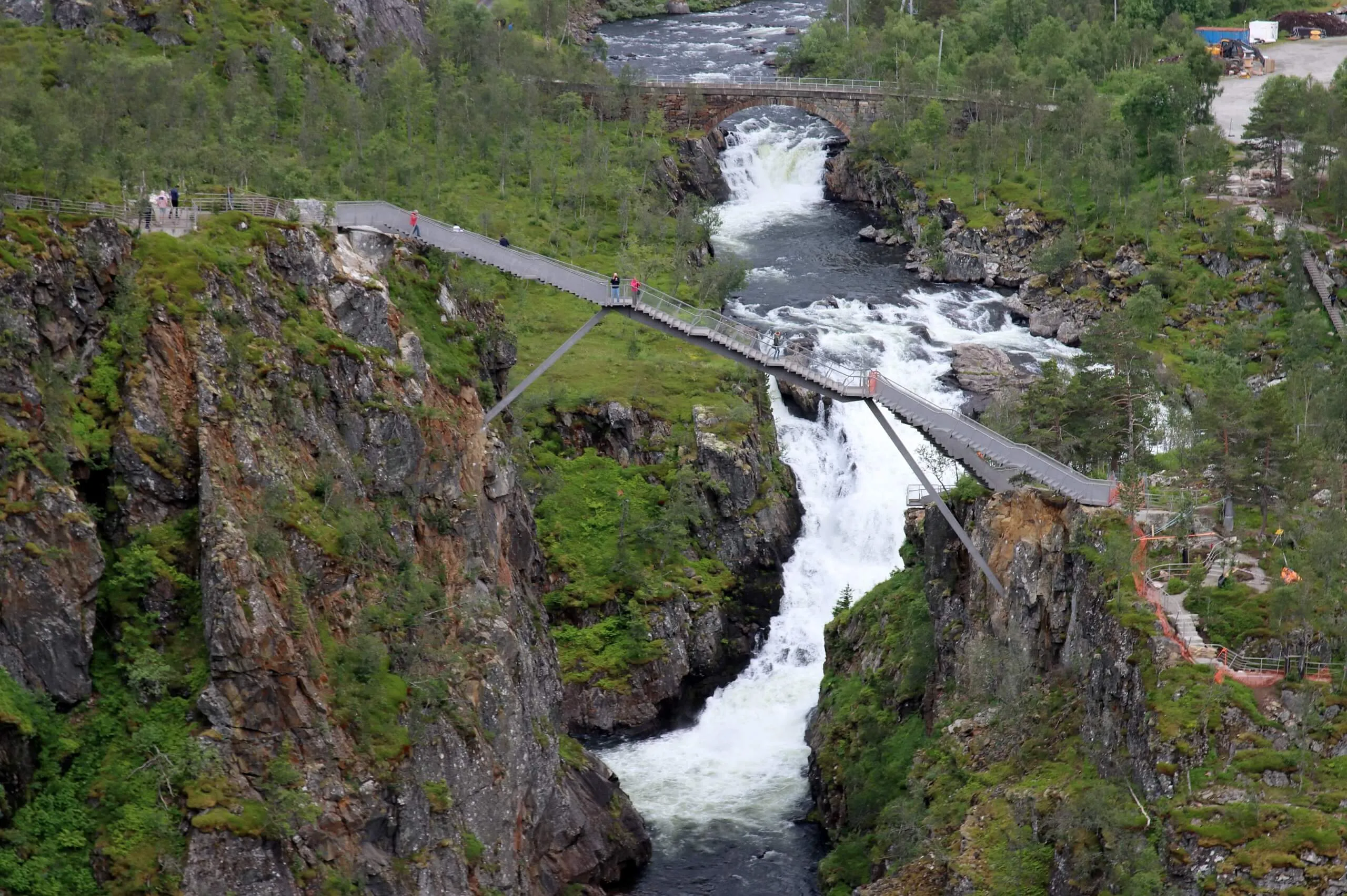 Completed Vøringsfossen pedestrian step bridge in Norway, featuring maintenance-free duplex stainless steel with a 120-year lifespan