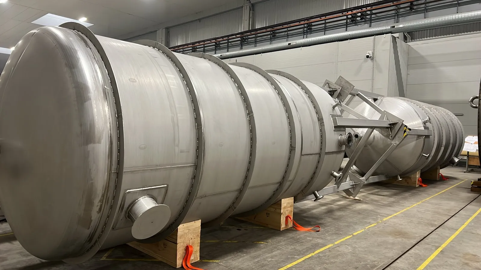 Two large stainless‑steel PED 2014/68/EU pressure vessels under fabrication in the Western Technological Solutions workshop in Klaipeda